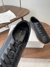 THE ROW 26S SNEAKERS IN BLACK CALFSKIN