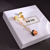 MIUMIU 26S ROSE QUARTZ BEADED ACORN DROP EARRINGS IN GOLD TONE METAL 614244