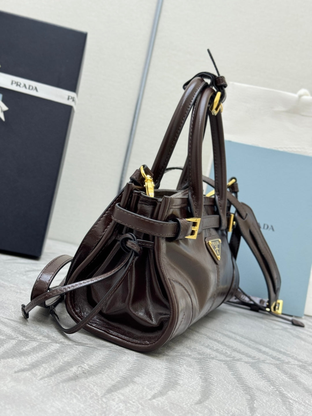 PRADA 25S BONNIE MINI HANDBAG 23 IN DARK BROWN CALFSKIN GOLD HARDWARE