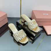 MATELASSÉ SLIDES PUMP IN GOLD PATENT CALFSKIN