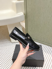 CHANEL 25S GODDESS FLAT LOAFERS IN BLACK GLOSSY CALFSKIN GOLD HARDWARE