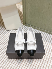 CHANEL 25S MARY JANE BALLET FLATS IN WHITE LAMBSKIN BLACK PATENT CAP TOE WITH BOW