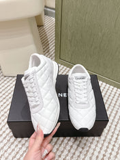CHANEL 25S SNEAKERS IN WHITE CALFSKIN AND SUEDE