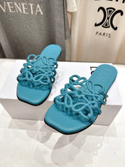 LOEWE 26S PETAL ANAGRAM SLIDE IN TEAL BLUE CALFSKIN