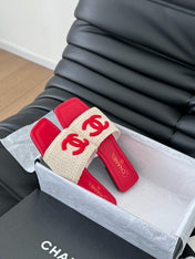 WOVEN SLIDE IN RAFFIA AND RUBY RED LAMBSKIN