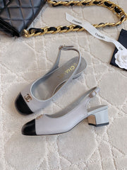 SLINGBACKS IN SLATE GREY MIX BLACK SHEEPSKIN