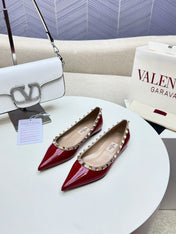 ROCKSTUD FLAT PUMP IN BERRY RED CALFSKIN