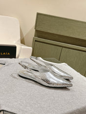 ALAIA SLINGBACK 25S IN SILVER PATENT LEATHER