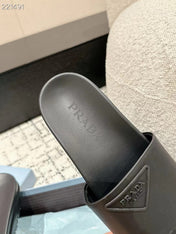 PRADA 25S RUBBER SLIDE IN CHARCOAL CALFSKIN WITH LOGO