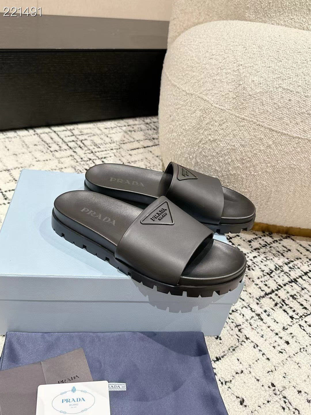 PRADA 25S RUBBER SLIDE IN CHARCOAL CALFSKIN WITH LOGO