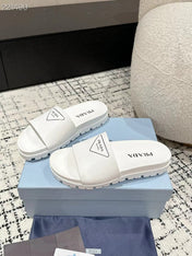 PRADA 25S RUBBER SLIDE IN WHITE CALFSKIN WITH LOGO