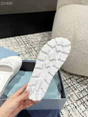 PRADA 25S RUBBER SLIDE IN WHITE CALFSKIN WITH LOGO
