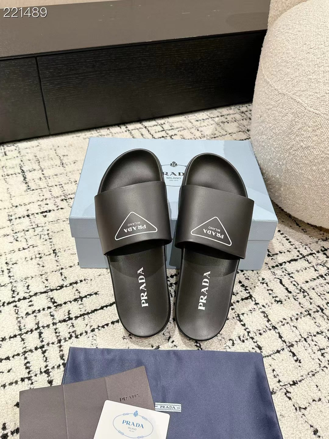 PRADA 25S RUBBER SLIDE IN BLACK CALFSKIN WITH LOGO