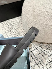 PRADA 25S RUBBER SLIDE IN BLACK CALFSKIN WITH LOGO