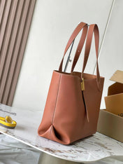 LOW KEY CABAS 47 IN SASSY SALMON GRAINED CALFSKIN GOLD BUCKLE