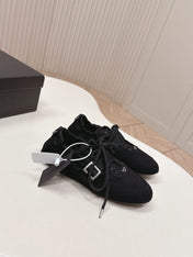 PRADA 26S LACE UP MINIMAL SNEAKERS IN BLACK CANVAS