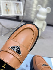 PRADA 25S THICK-SOLE LOAFERS 60 MM IN COGNAC BROWN CALFSKIN