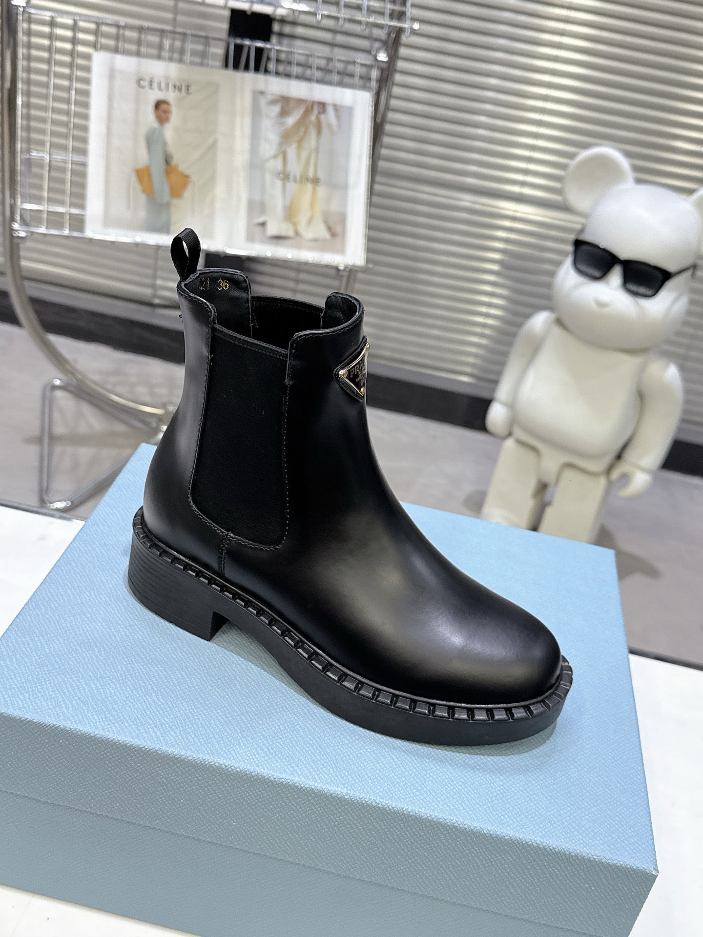 PRADA 25S RETRO PLATFORM MARTIN BOOTS IN BLACK CALFSKIN