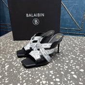 BALMAIN 26S HIGH-HEEL SANDALS 95 MM IN BLACK CALFSKIN AND WHITE FABRIC