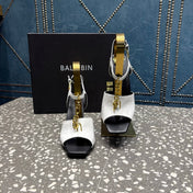 BALMAIN 26S HIGH-HEEL SANDALS 95 MM IN BLACK AND WHITE CALFSKIN