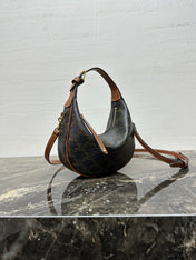 CELINE 25S TEEN LULU BAG 24 IN BLACK TRIOMPHE CANVAS AND BROWN CALFSKIN TRIM
