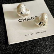 CHANEL 26S TEXTURED HEART CC LOGO STUD EARRINGS IN SILVER METAL 629192