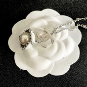 CHANEL 26S DOUBLE C LOGO PEARL DROP PENDANT NECKLACE WITH CRYSTAL HALO IN SILVER METAL 633293