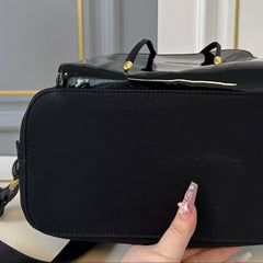 BACKPACK 25 IN BLACK RE-NYLON AND PATENT CALFSKIN GOLD HARDWARE