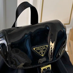 BACKPACK 25 IN BLACK RE-NYLON AND PATENT CALFSKIN GOLD HARDWARE
