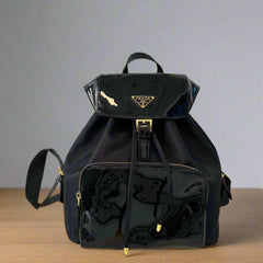 BACKPACK 25 IN BLACK RE-NYLON AND PATENT CALFSKIN GOLD HARDWARE