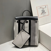 HERBAG A DOS ZIP RETOURNE BACKPACK 29 IN OFF-WHITE MIX BLACK CANVAS AND CALFSKIN