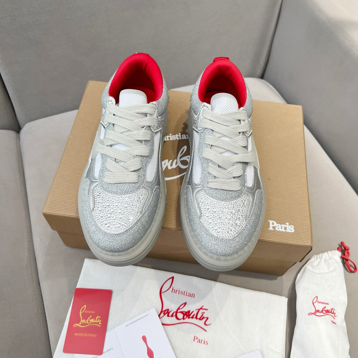 ASTROLOUBI SNEAKER IN SILVER CALFSKIN SPIKES RHINESTONE DETAILS