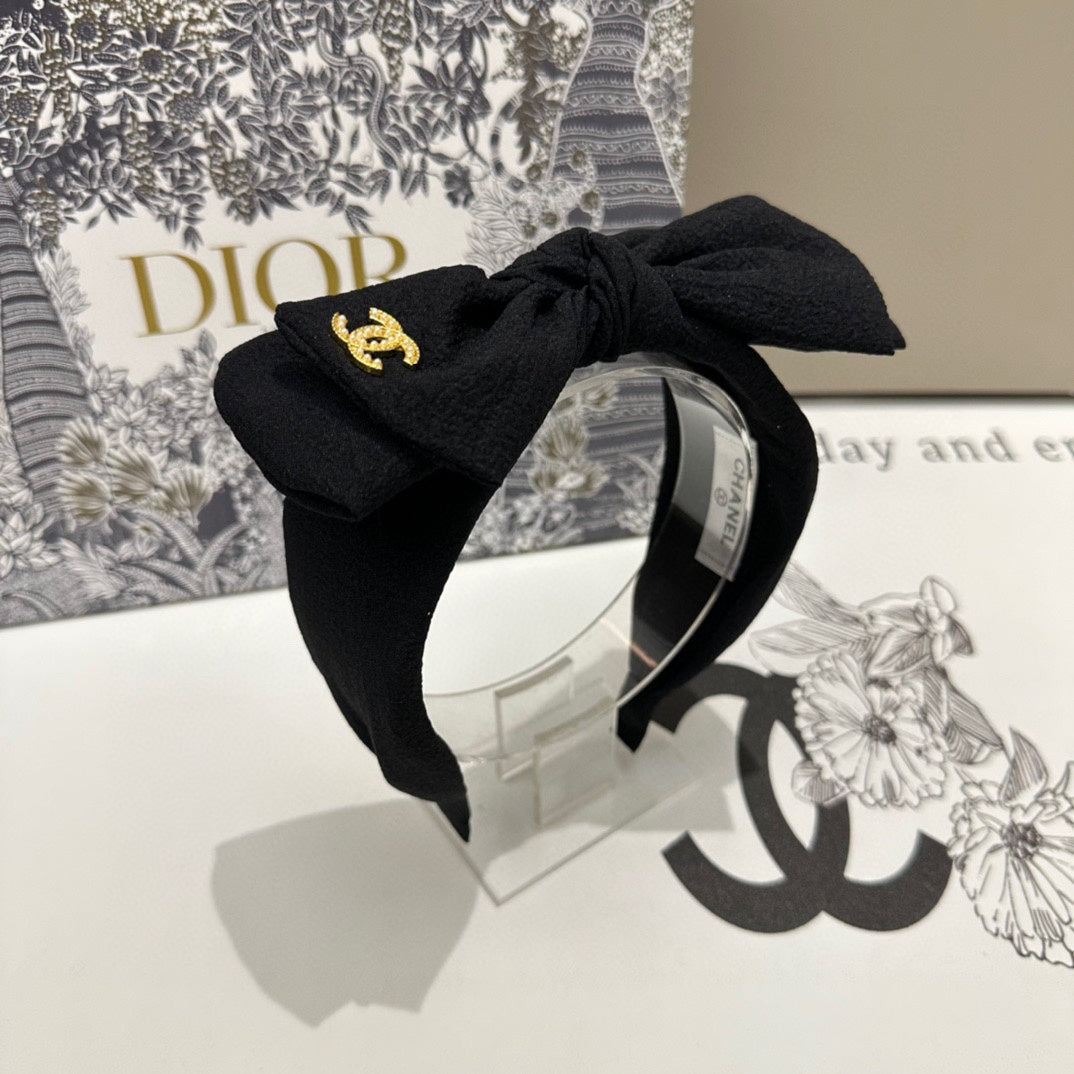 BLACK FABRIC HEADBAND WITH BOW 168569