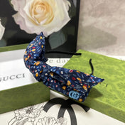 HAIRBAND IN NAVY BLUE FLORAL FABRIC 385854