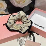 HAIR TIE IN BEIGE MIX BLACK SPANDEX FABRIC 432828
