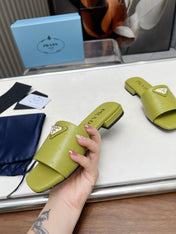 PRA SAFFIANO PATENT SLIDES OSTRICH MOTIF PEAR CALFSKIN