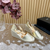 SL WEDGE SANDALS METALLIC GOLD CALFSKIN AND STRAW