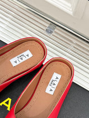ALAIA FLAT MULE IN CRIMSON RED LAMBSKIN