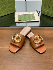 FLAT MULE IN BRONE BROWN CALFSKIN WITH GOLD HARDWARE