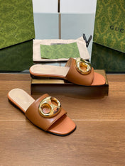 FLAT MULE IN BRONE BROWN CALFSKIN WITH GOLD HARDWARE
