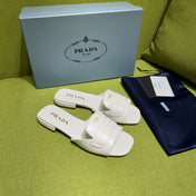 PRADA 25S SLIDES IN WHITE CALFSKIN