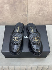 CHANEL 26S MULE LOAFERS IN BLACK QUILTED CALFSKIN WITH CC LOGO