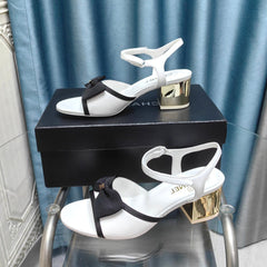 SANDALS IN WHITE SHEEPSKIN WITH BLACK SATIN BOW