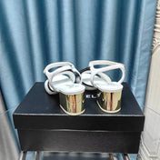 SANDALS IN WHITE SHEEPSKIN WITH BLACK SATIN BOW