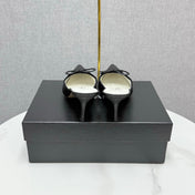 CC HEEL MULES 25S IN BLACK LAMBSKIN WITH BOW