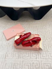BOW MARY JANE FLAT IN RED NAPLAK LAMBSKIN