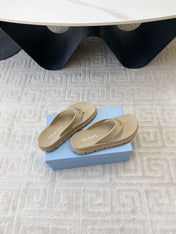 THICK-SOLED FLIP FLOPS IN ECRU BEIGE RUBBER