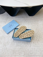 THICK-SOLED FLIP FLOPS IN ECRU BEIGE RUBBER