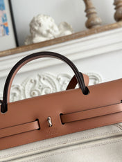 ZIP CABINE 31 BAG IN PALE GRAY CANVAS AND BRONZE BROWN CALFSKIN