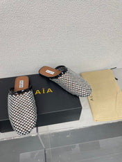 ALAIA FLAT MULES IN STRASS BLACK LAMBSKIN WITH RHINSTONES